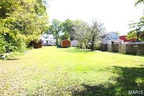 805 N Carleton, Farmington, MO 63640 - view of green lawn featuring a shed