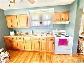 805 N Carleton, Farmington, MO 63640 - kitchen with white electric stove, ventilation hood, light wood-type flooring, and ceiling fan