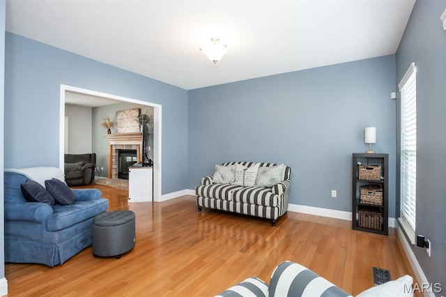 804 Cardiff Ct, Ofallon, IL 62269 - living room featuring wood finished floors and a brick fireplace