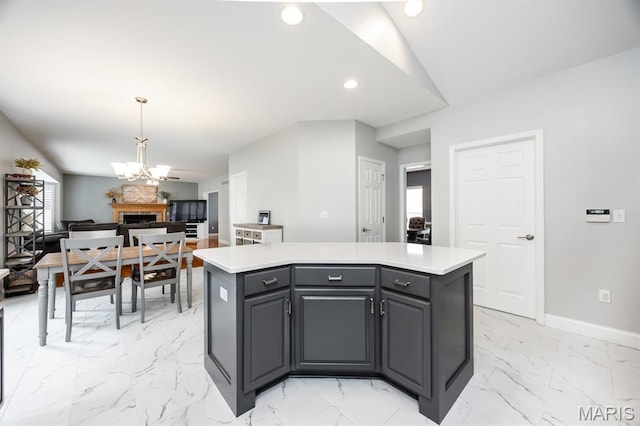 804 Cardiff Ct, Ofallon, IL 62269 - kitchen featuring a center island, light marble finish flooring, light countertops, gray cabinets, and recessed lighting