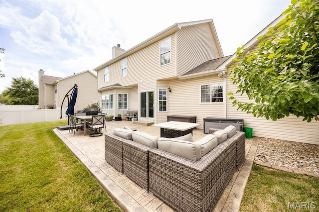 804 Cardiff Ct, Ofallon, IL 62269 - back of property with an outdoor living space, a patio area, and a chimney