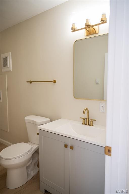 7346 Hazelcrest Dr, Hazelwood, MO 63042 - half bath with vanity and toilet