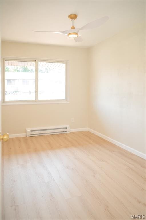 7346 Hazelcrest Dr, Hazelwood, MO 63042 - unfurnished room with baseboard heating, light wood-style floors, and a ceiling fan