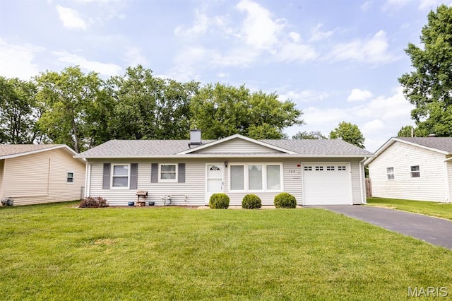 508 Joy Dr, Ofallon, IL 62269 - ranch-style house featuring an attached garage, asphalt driveway, a front lawn, a chimney, and a shingled roof
