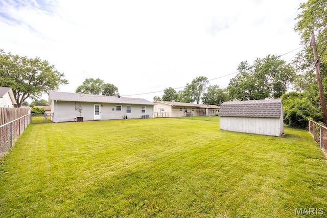 508 Joy Dr, Ofallon, IL 62269 - fenced backyard with a shed