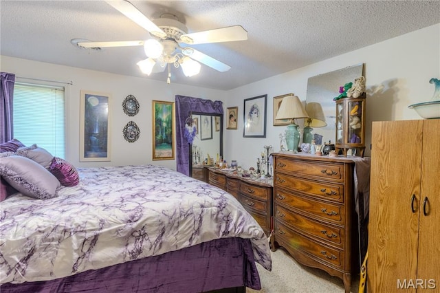 106 Red Bud Cir, Saint Robert, MO 65584 - carpeted bedroom featuring a textured ceiling and a ceiling fan