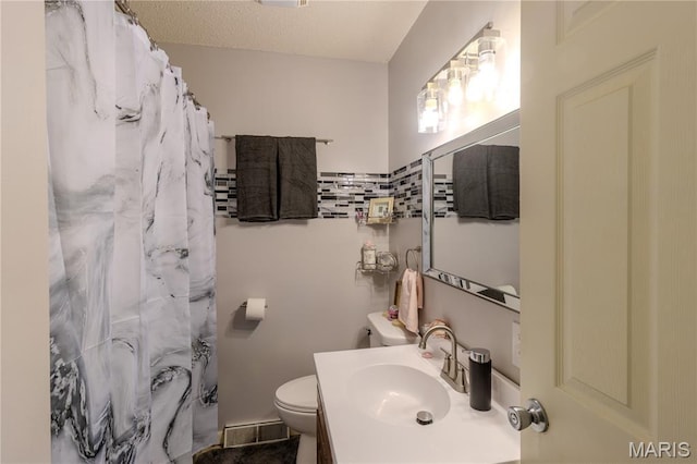 106 Red Bud Cir, Saint Robert, MO 65584 - bathroom featuring vanity, a baseboard heating unit, and a shower with curtain