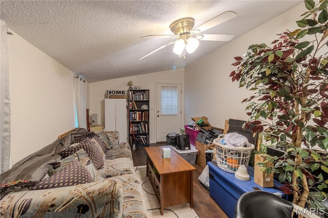 106 Red Bud Cir, Saint Robert, MO 65584 - living area with wood finished floors, vaulted ceiling, ceiling fan, and a textured ceiling