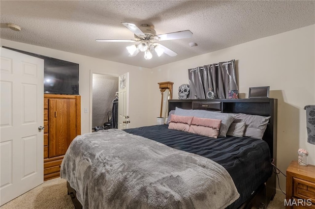 106 Red Bud Cir, Saint Robert, MO 65584 - carpeted bedroom with a textured ceiling and a ceiling fan