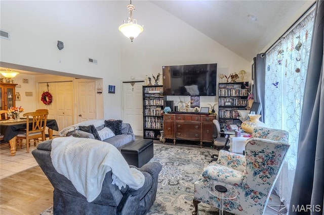 106 Red Bud Cir, Saint Robert, MO 65584 - living area with high vaulted ceiling