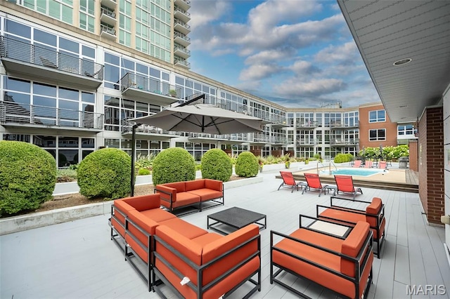 9 N Euclid Ave Unit 509, Saint Louis, MO 63108 - view of home's community with an outdoor living space, a swimming pool, and a patio area