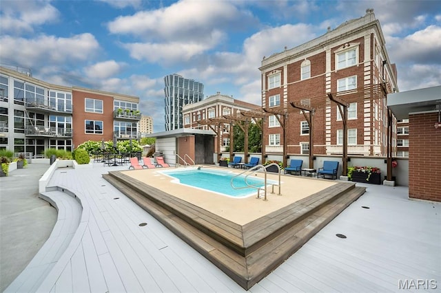 9 N Euclid Ave Unit 509, Saint Louis, MO 63108 - view of swimming pool featuring a storage shed