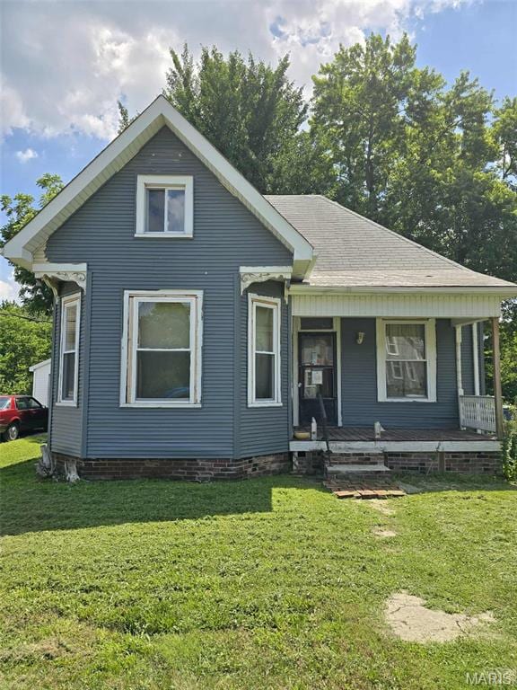 1210 Constance St, Collinsville, IL 62234 - bungalow-style house featuring a front lawn and covered porch