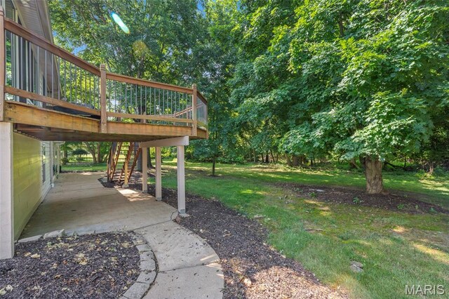 2028 During Dr, Arnold, MO 63010 - view of green lawn featuring stairway, a wooden deck, and a patio