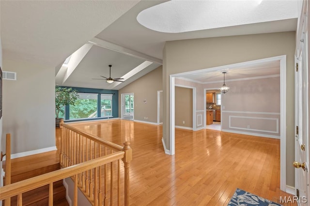 2028 During Dr, Arnold, MO 63010 - hallway with light wood finished floors and a chandelier