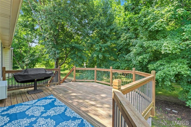 2028 During Dr, Arnold, MO 63010 - deck featuring area for grilling and view of wooded area