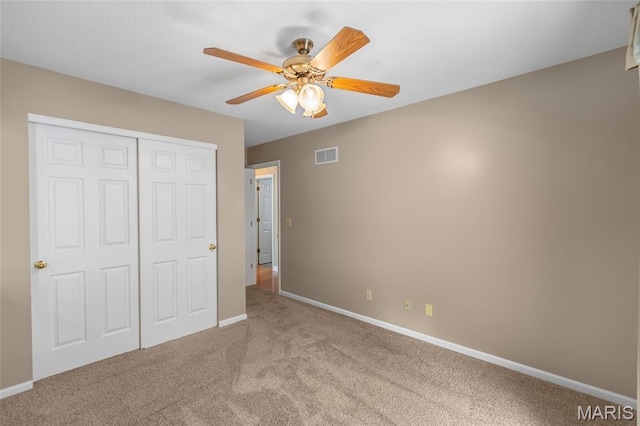 2028 During Dr, Arnold, MO 63010 - unfurnished bedroom with carpet flooring, a closet, and a ceiling fan