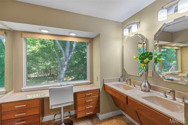 2028 During Dr, Arnold, MO 63010 - bathroom with double vanity and baseboards