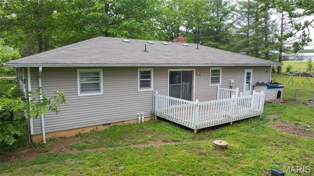 19954 Ironwood Ln, Lebanon, MO 65536 - back of property with a deck, a chimney, a shingled roof, and crawl space