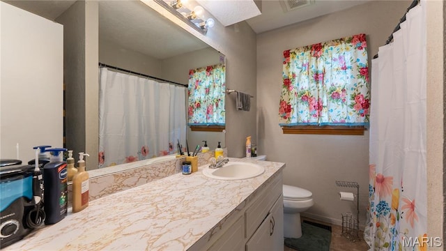 19954 Ironwood Ln, Lebanon, MO 65536 - bathroom with vanity, a skylight, and a shower with curtain