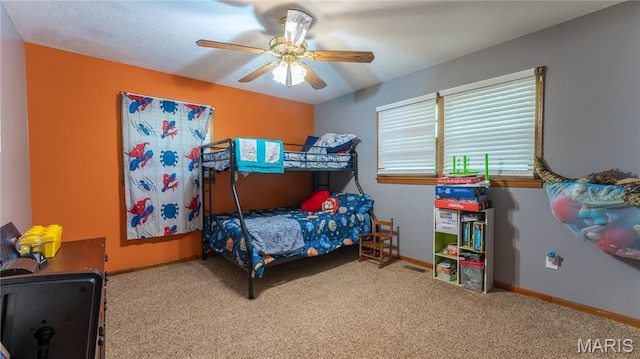 19954 Ironwood Ln, Lebanon, MO 65536 - carpeted bedroom featuring baseboards and ceiling fan