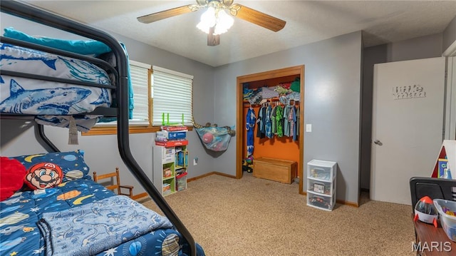 19954 Ironwood Ln, Lebanon, MO 65536 - bedroom featuring carpet floors, a ceiling fan, and a closet