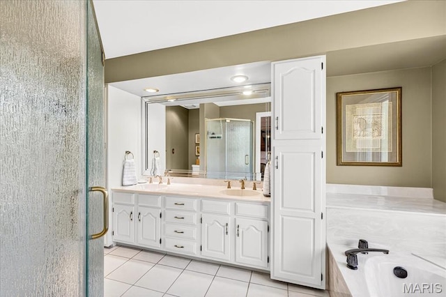 14308 Conway Meadows Ct Unit 203, Chesterfield, MO 63017 - full bathroom with tile patterned floors, a stall shower, double vanity, and a garden tub
