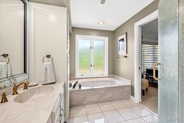 14308 Conway Meadows Ct Unit 203, Chesterfield, MO 63017 - ensuite bathroom with vanity, a garden tub, and tile patterned floors