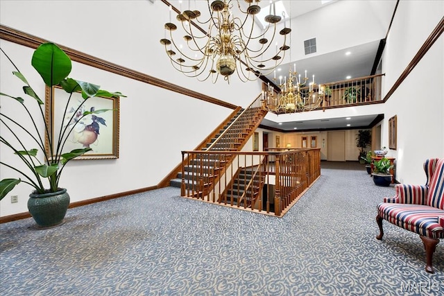 14308 Conway Meadows Ct Unit 203, Chesterfield, MO 63017 - stairway featuring a high ceiling, a chandelier, carpet floors, and ornamental molding
