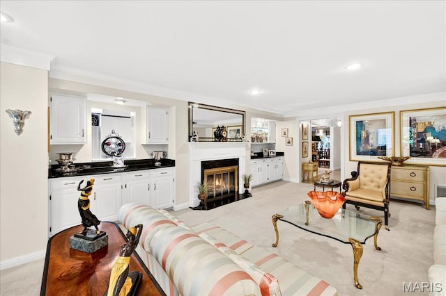 14308 Conway Meadows Ct Unit 203, Chesterfield, MO 63017 - living room featuring crown molding, light carpet, a fireplace with flush hearth, and recessed lighting