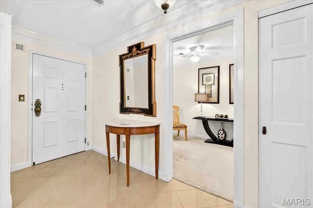 14308 Conway Meadows Ct Unit 203, Chesterfield, MO 63017 - entryway with a ceiling fan, crown molding, light tile patterned flooring, and light colored carpet