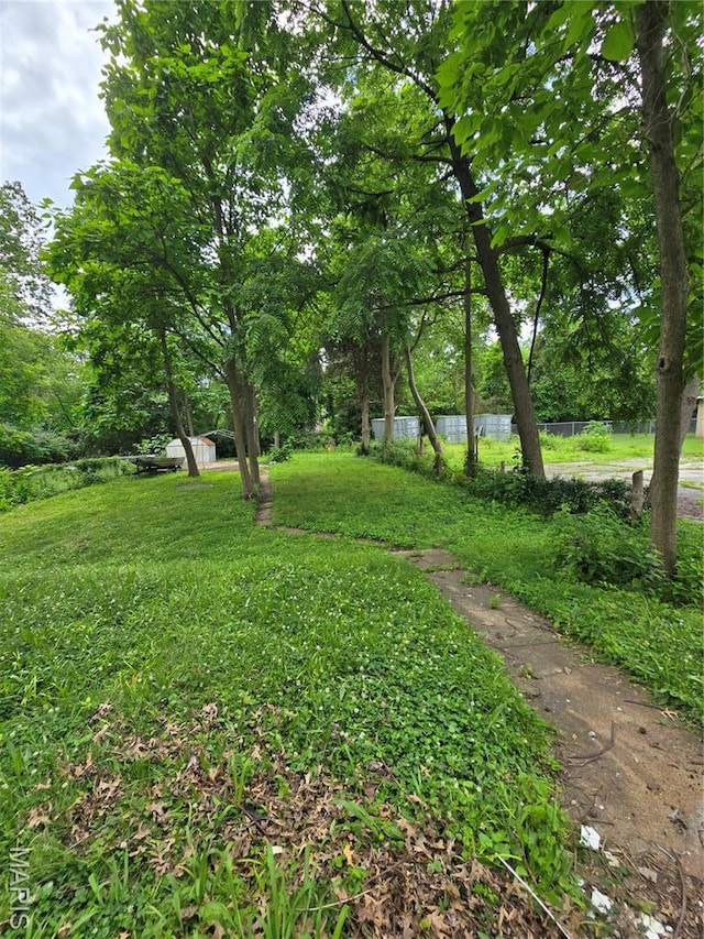 8108 Saint Charles Rock Rd, Saint Louis, MO 63114 - view of yard with a storage unit