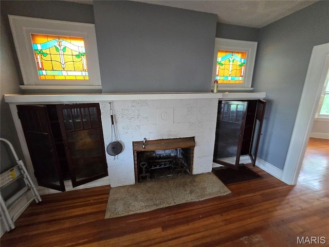 8108 Saint Charles Rock Rd, Saint Louis, MO 63114 - detailed view of a fireplace and wood finished floors