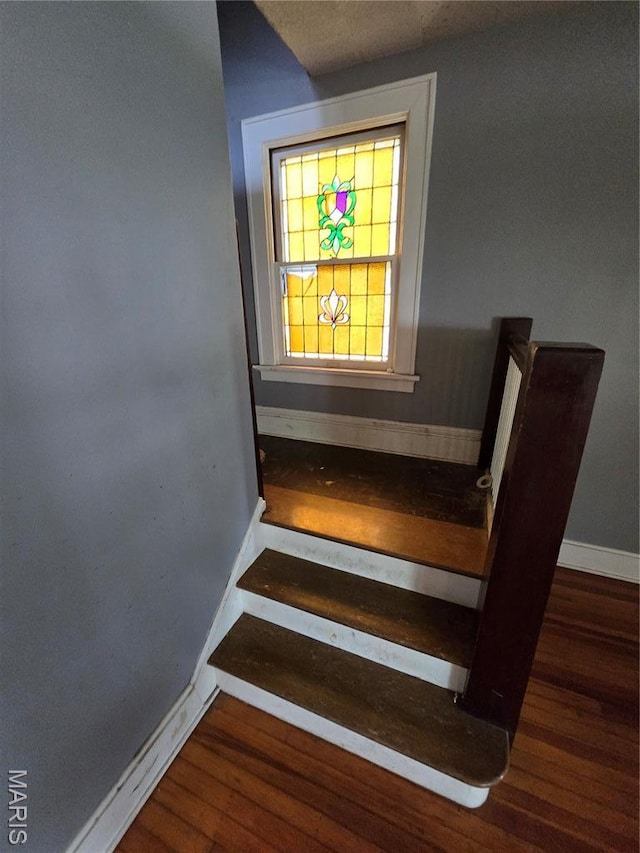 8108 Saint Charles Rock Rd, Saint Louis, MO 63114 - stairway with wood finished floors