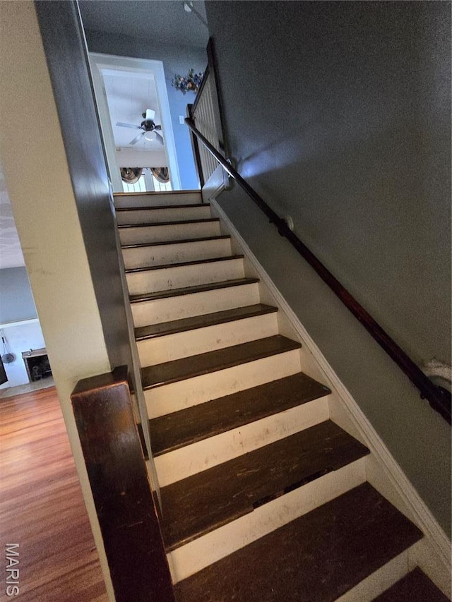 8108 Saint Charles Rock Rd, Saint Louis, MO 63114 - staircase with wood finished floors and ceiling fan