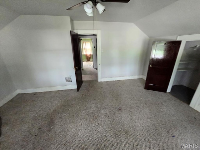8108 Saint Charles Rock Rd, Saint Louis, MO 63114 - bonus room with vaulted ceiling, a ceiling fan, and carpet flooring