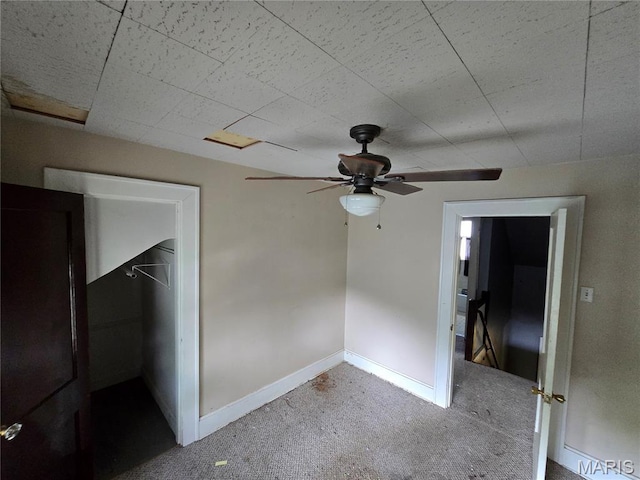 8108 Saint Charles Rock Rd, Saint Louis, MO 63114 - unfurnished bedroom featuring carpet floors and ceiling fan