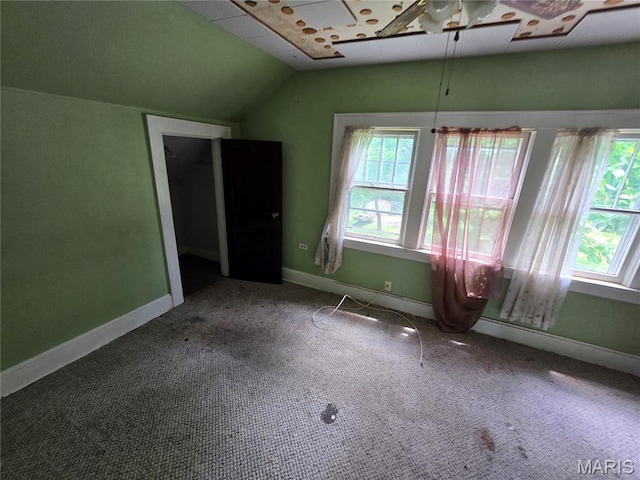 8108 Saint Charles Rock Rd, Saint Louis, MO 63114 - unfurnished room with lofted ceiling, plenty of natural light, a ceiling fan, and carpet