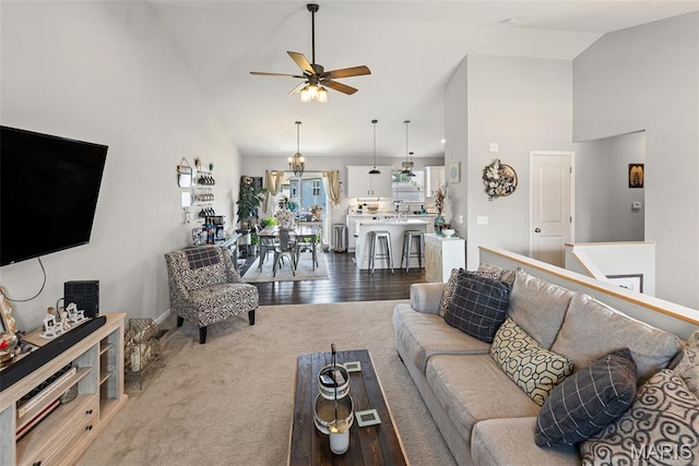 101 Shiloh Ridge Dr, Shiloh, IL 62221 - living area featuring a ceiling fan, high vaulted ceiling, and dark colored carpet