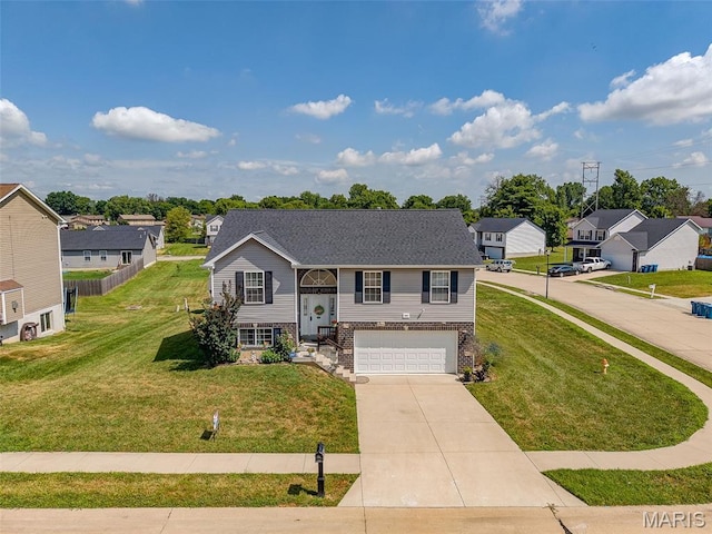 101 Shiloh Ridge Dr, Shiloh, IL 62221 - view of front of home featuring driveway, an attached garage, brick siding, and a residential view
