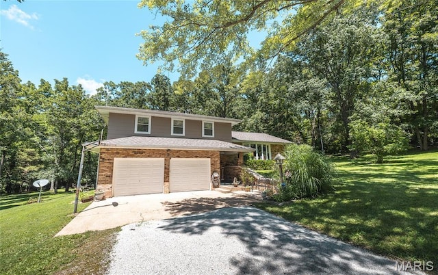 15550 US Highway 63, Rolla, MO 65401 - split level home featuring driveway, a garage, a front lawn, and brick siding