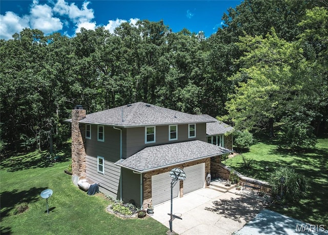 15550 US Highway 63, Rolla, MO 65401 - view of front of house featuring a chimney, a shingled roof, concrete driveway, and a front lawn