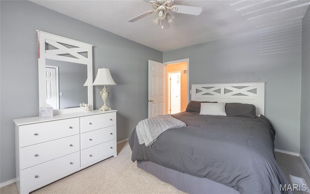 15550 US Highway 63, Rolla, MO 65401 - bedroom with light carpet and ceiling fan