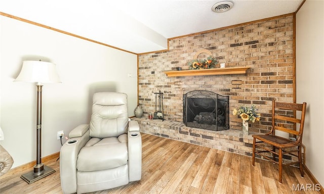 15550 US Highway 63, Rolla, MO 65401 - living room with wood finished floors and a fireplace