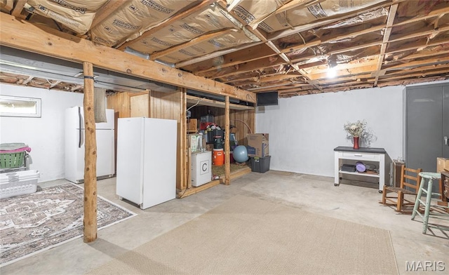 15550 US Highway 63, Rolla, MO 65401 - unfinished below grade area featuring freestanding refrigerator