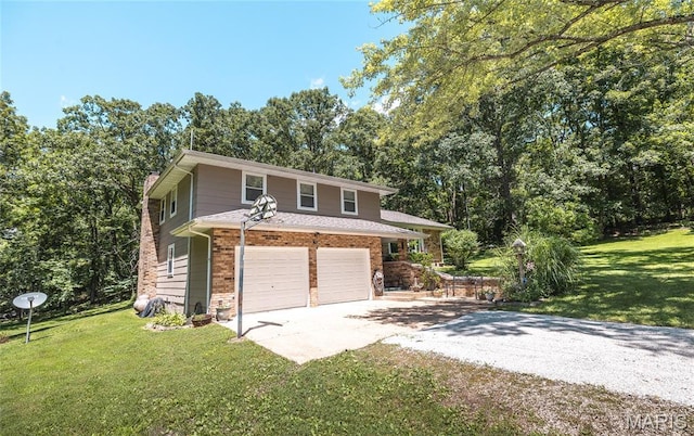 15550 US Highway 63, Rolla, MO 65401 - view of front of property featuring concrete driveway, brick siding, a front lawn, and a garage