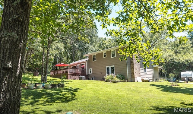 15550 US Highway 63, Rolla, MO 65401 - view of green lawn with a deck