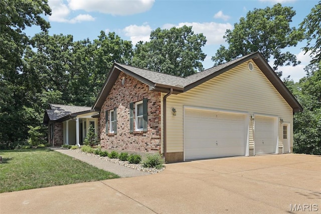 67 High Trails Dr, Eureka, MO 63025 - single story home with concrete driveway, a garage, brick siding, a front lawn, and a shingled roof