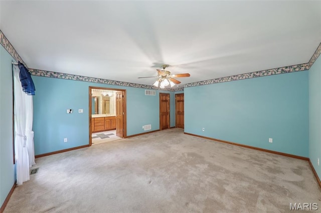 67 High Trails Dr, Eureka, MO 63025 - unfurnished bedroom featuring light colored carpet, ensuite bathroom, and ceiling fan