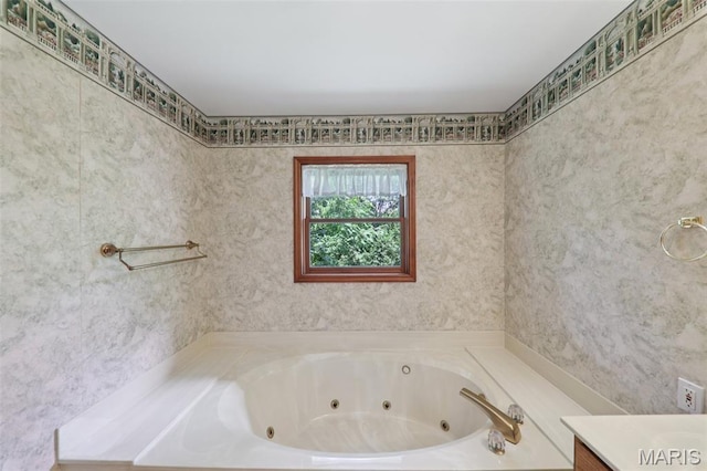 67 High Trails Dr, Eureka, MO 63025 - bathroom featuring a tub with jets and vanity